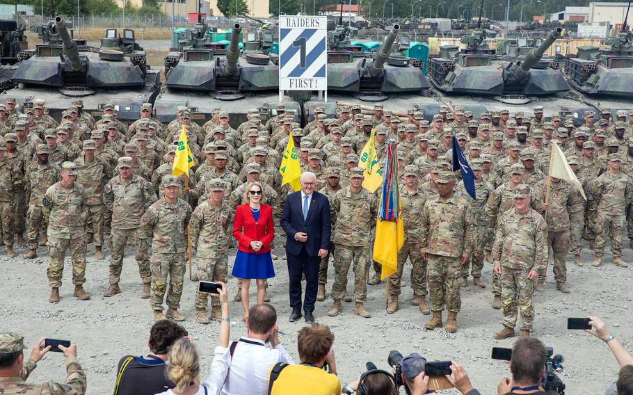 German President Frank-Walter Steinmeier, U.S. Ambassador to Germany Amy Gutmann, U.S. Army Europe and Africa commander Gen. Darryl Williams, and Brig. Gen. Joseph Hilbert pose with 1st Armored Brigade Combat Team, 3rd Infantry Division soldiers at Grafenwoehr Training Area July 13, 2022. Alcohol is now barred for the unit after incidents involving five different soldiers getting arrested for riding electronic scooters while intoxicated, Army officials said this week.