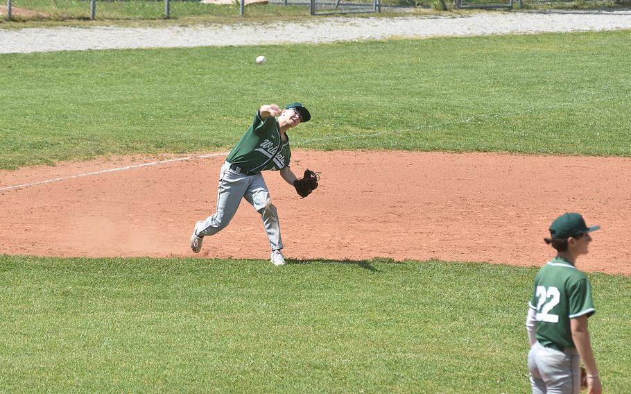 Naples third baseman Brady Price throws to first after fielding a grounder Saturday, April 20, 2024, in a game against the Vicenza Cougars.