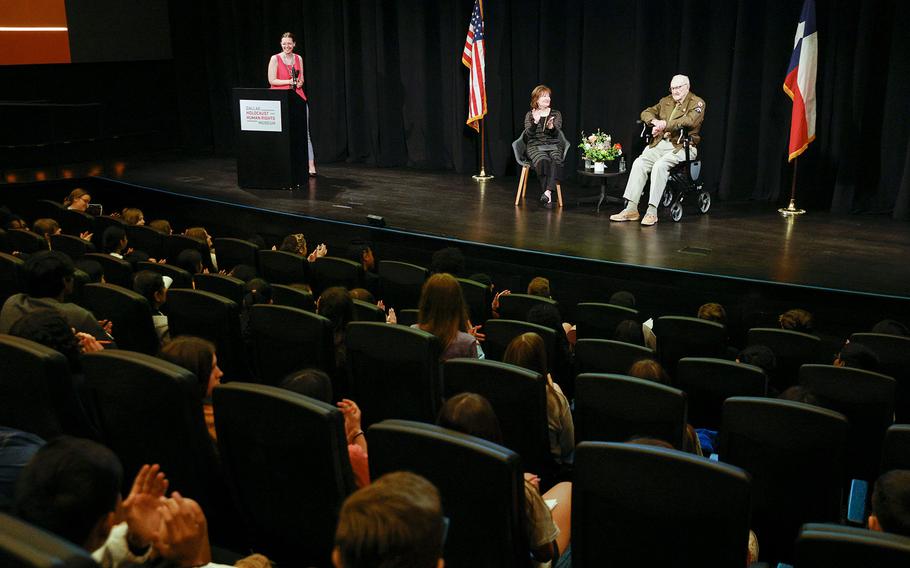 Students applaud after WIlliam “Bill” Kongable spoke during a presentation alongside moderator Fran Berg at the Dallas Holocaust and Human Rights Museum in downtown Dallas, Thursday, May 4, 2023.