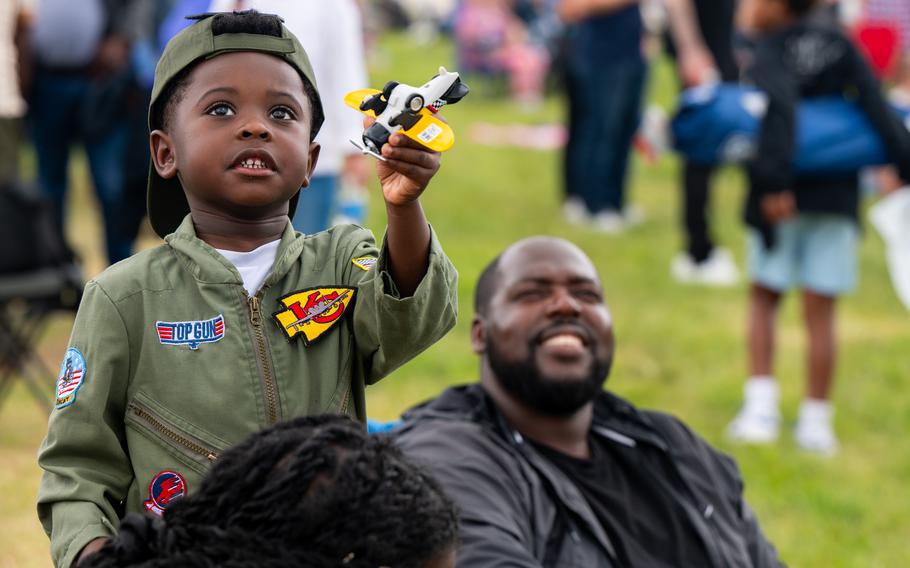 August Vaughns and DeAntonio Vaughns watch Tora! Tora! Tora! perform during The Great Texas Airshow at Joint Base San Antonio-Randolph, Saturday, April 6, 2024. 