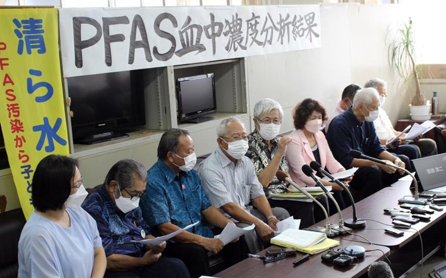 Members of Liaison to Protect the Lives of Citizens Against PFAS Contamination speak to reporters in Naha, Okinawa, Oct. 15, 2022. 