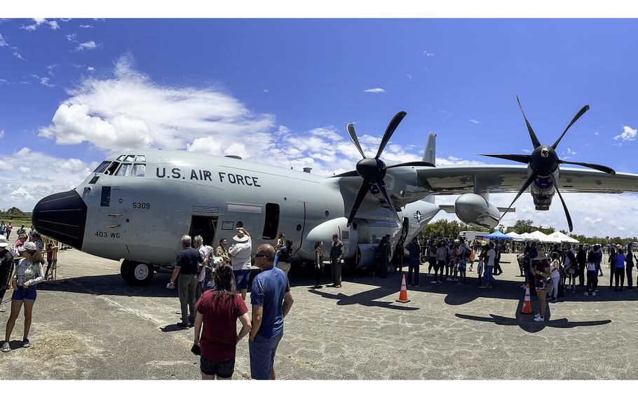 A Reserve Citizen Airmen crew and a WC-130J Super Hercules aircraft are showcased in April 2023 in Puerto Rico. 