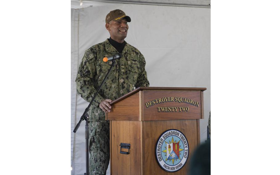Capt. Milciades “Tony” Then, commodore, Destroyer Squadron 22, speaks during the DESRON 22 change of command ceremony on board the Arleigh Burke-class guided-missile destroyer USS Mitscher (DDG 57) on Dec. 3. 2021. 