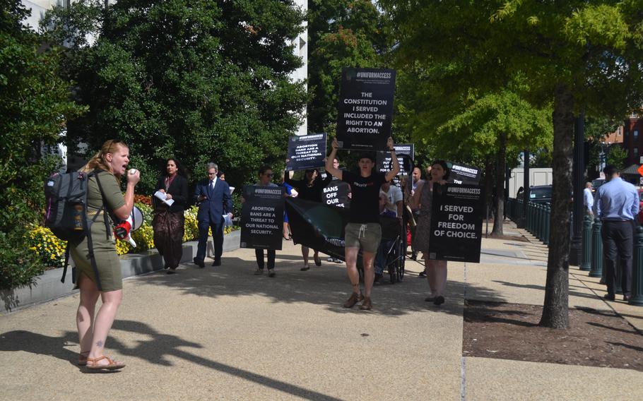 Veterans and advocates marched to the Capitol on Sept. 28, 2022. They held a news conference to urge the Defense and Veterans Affairs departments and lawmakers to do more to provide abortion and reproductive health care services for veterans and service members, which they say could affect national security, recruitment and retention. 