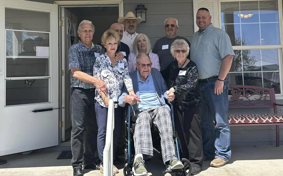 Colorado Rep. Richard Holtorf, back and center, and Colorado Sen. Byron Pelton, far right, pose with World War II veteran Eugene Brown of Colorado, who on Sunday, April 31, 2023, celebrated his 100th birthday.