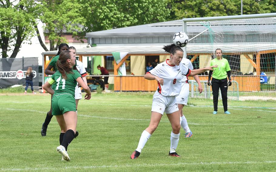 American Overseas School of Rome midfielder Reiley Lester breaks up a cross during a Division II semifinal match against Naples at the DODEA European soccer championships on May 17, 2023, at VfR Baumholder's stadium in Baumholder, Germany.