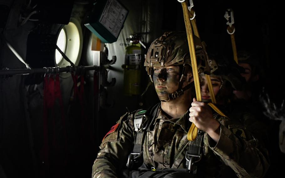 Sgt. Kaity Andersen gets set to jump out of a C-130 Hercules on March 14, 2024, during the 173rd Airborne Brigade's all-female parachute jump near Vajont, Italy.