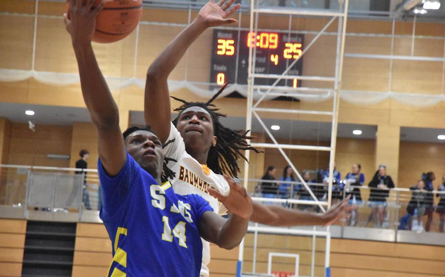 Leo Kirkland gets set to block a shot.