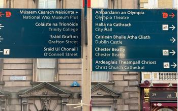 Road sign in Dublin with places in English and Irish languages