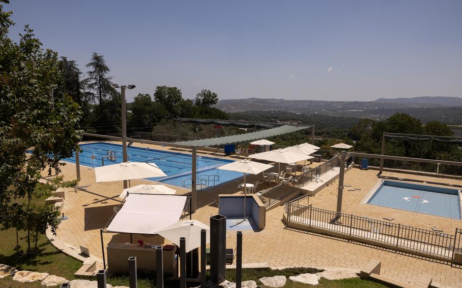 The pool complex at Kibbutz Sasa, without any swimmers. The few Israelis who stayed in northern Israel to defend the border did not expect to be without their families for so long. 