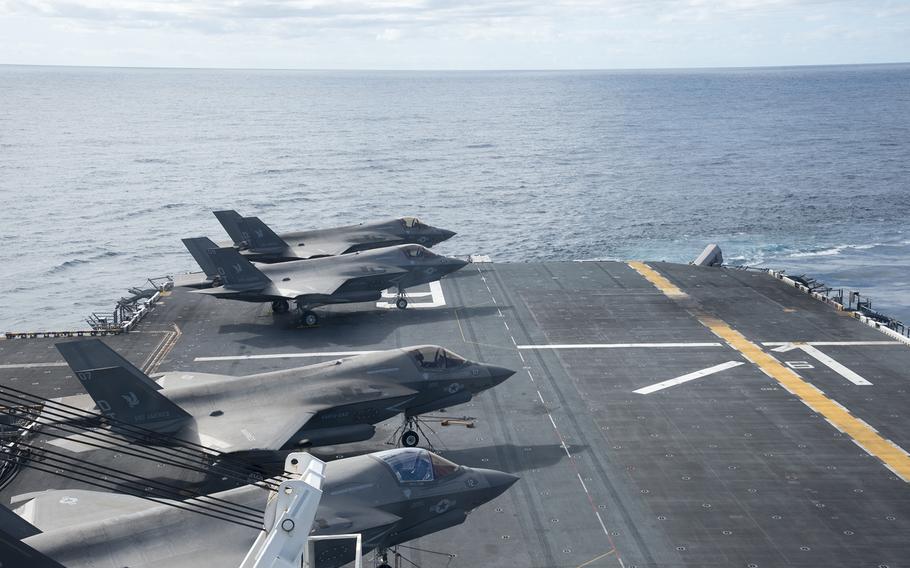 F-35B Lightning II stealth fighters pack the USS America's flight deck in the Coral Sea, July 31, 2023. 