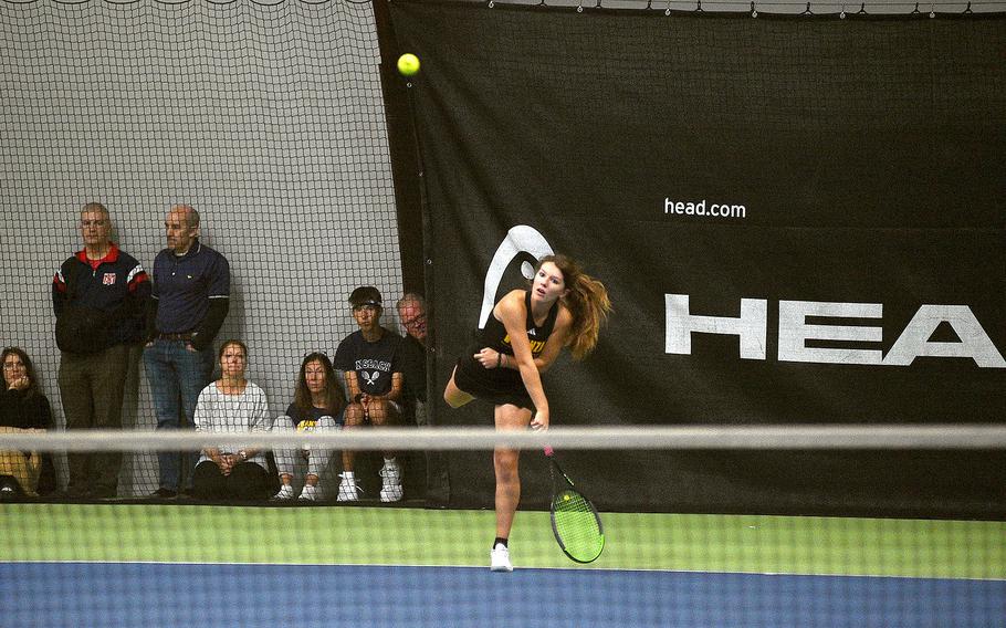 Vicenza's Sarah Gordon serves against Ansbach's Meredith Maxwell in pool-play action of the DODEA European tennis championships on Oct. 19, 2023, at T2 Sports Health Club in Wiesbaden, Germany.