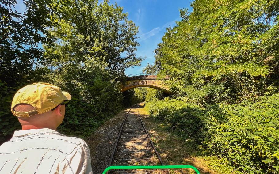 Visitors to the draisine tour between Altenglan and Staudernheim, Germany, ride the abandoned railroad track on their own, able to explore towns along the way. 