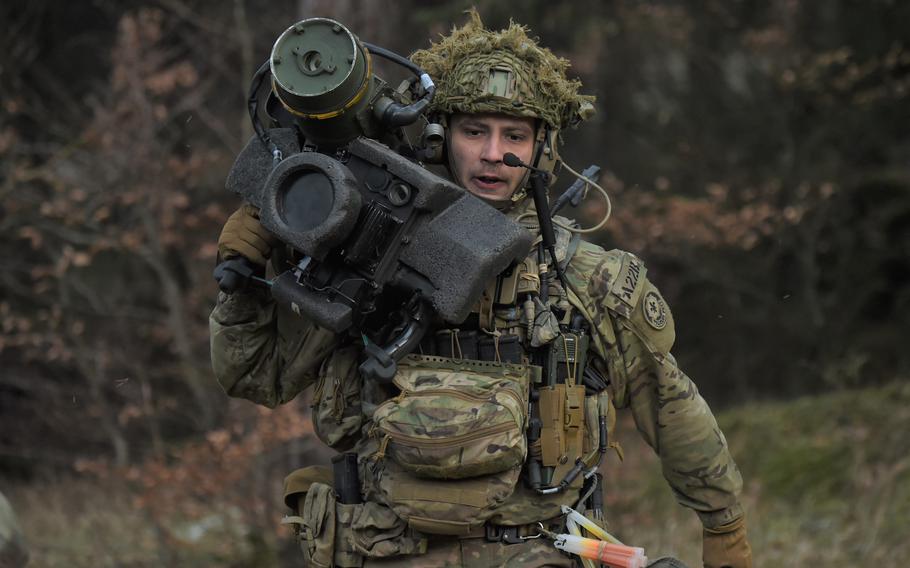 Sgt. Jacob Cavaleri of the 2nd Cavalry Regiment simulates using a Javelin to ambush enemy tanks during the Dragoon Ready exercise on Jan. 29, 2023, at the Joint Multinational Readiness Center in Hohenfels, Germany.