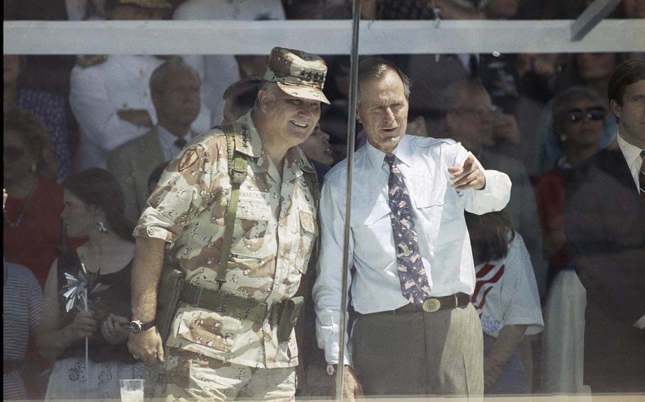 Schwarzkopf in uniform and Bush.