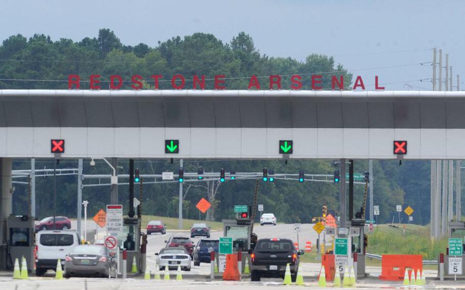 Cars wait at Redstone Arsenal Gate 9.