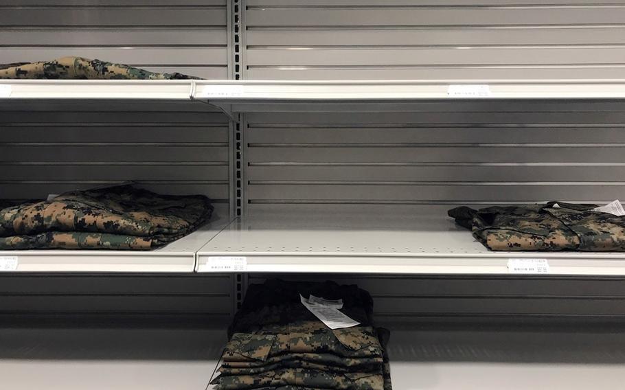 The shelves were mostly empty of camouflage uniforms at the exchange on Marine Corps Air Station Iwakuni, Japan, Wednesday, Oct. 4, 2023.