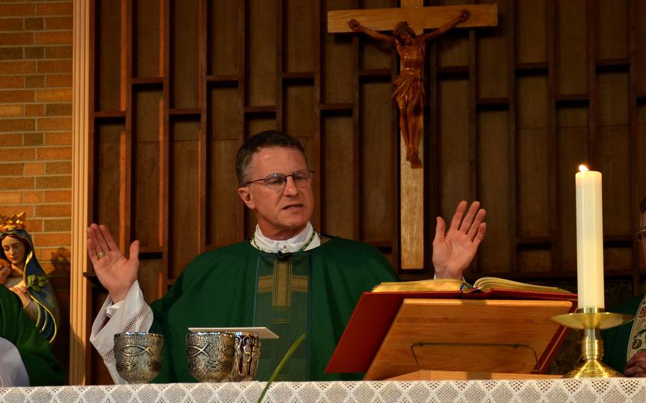 Archbishop Timothy Broglio leads a Sunday mass in 2012 at NAS Oceana in Virginia Beach, Va. Catholics in the U.S. military have the right to refuse the coronavirus vaccination if they have a moral objection to the inoculation, said Broglio, archbishop for the military services, said in a statement Oct. 12, 2021.