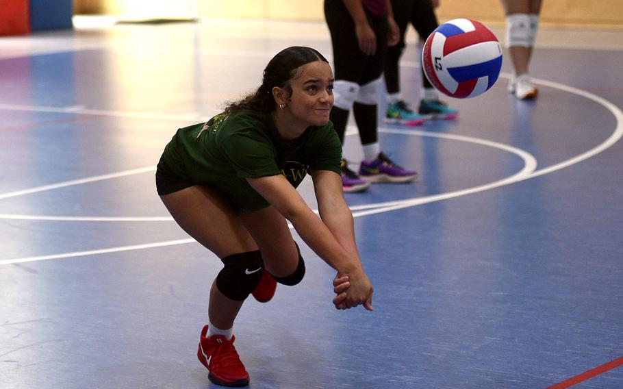Faith Coley tries to dig.