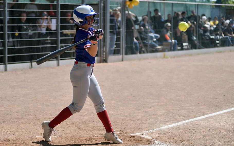 Isabella Chambers swings.