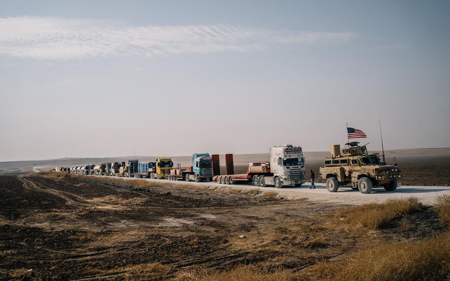 A U.S. military convoy carries equipment from a base in northern Syria on Oct. 28, 2019.