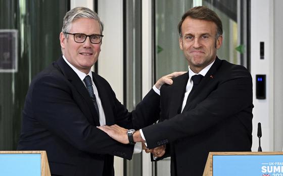 British Prime Minister Keir Starmer, left, and French President Emmanuel Macron hold a joint press conference in London, Thursday July 10, 2025. (Leon Neal/Pool Photo via AP)