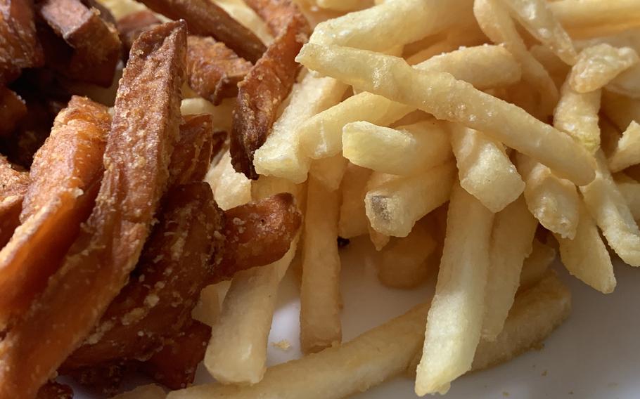 A mix of sweet potato and regular fries from Burgerme includes an example of the classic American standard cut fry, May 29, 2021.