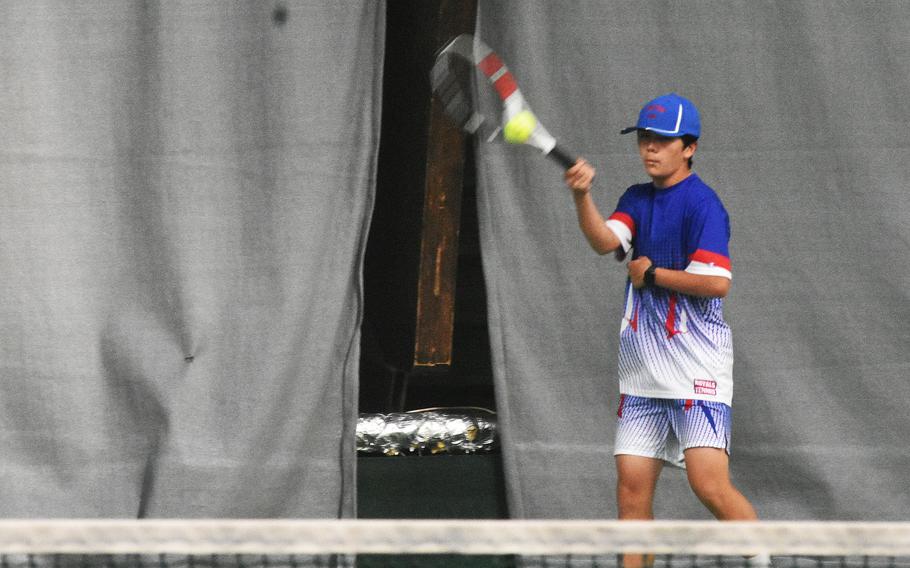 Ramstein’s Keegan Cornelius uses a forehand in a boys singles semifinal Friday, Oct. 22, 2021, at the DODEA-Europe tennis championships.