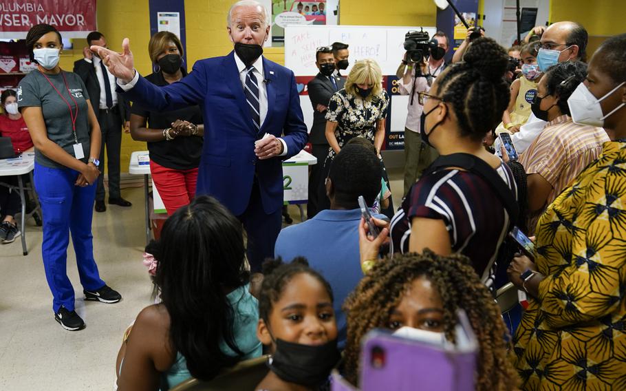 President Joe Biden visits a COVID-19 vaccination clinic at the Church of the Holy Communion Tuesday, June 21, 2022, in Washington.