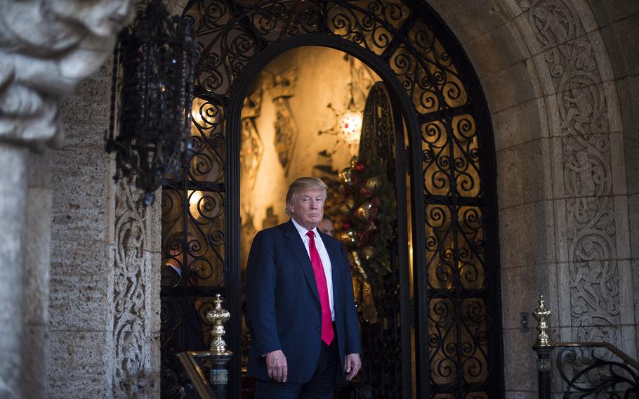 Donald Trump, seen in 2016 at his Mar-a-Lago Club in Palm Beach, Fla., claimed an FBI raid at the club Monday was “not necessary or appropriate.” He accused Democrats of weaponizing the “justice system” against him. 