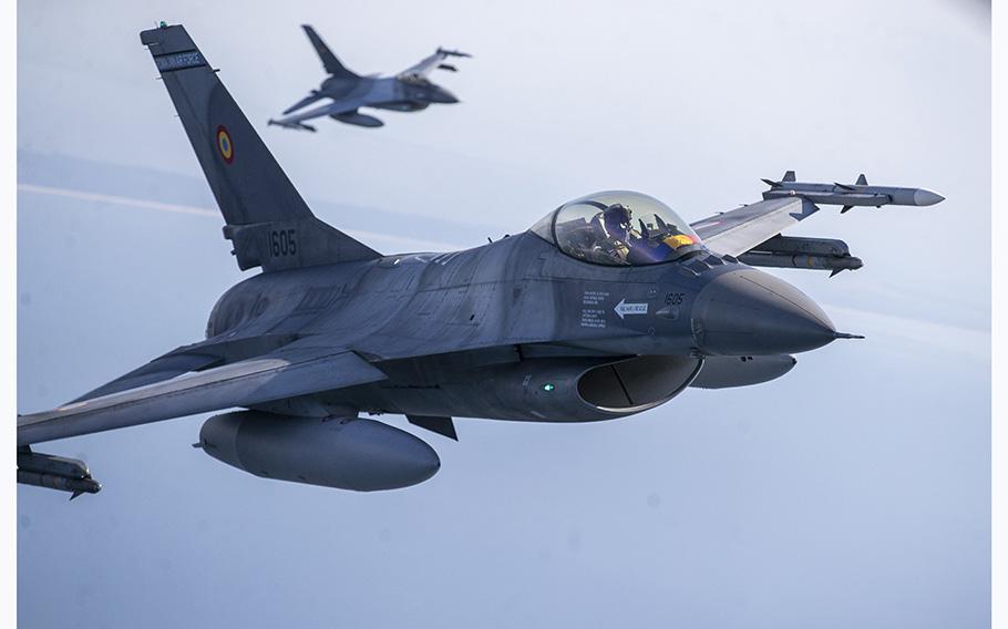 Portuguese Air Force F- 16 military fighter jets participating in NATO’s Baltic Air Policing Mission operate in Lithuanian airspace, on Monday, May 22, 2023. 