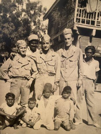 Gilbert Howland, standing tall at far right, poses with fellow Merrill’s Marauders in January 1944 just before they walked into Burma.