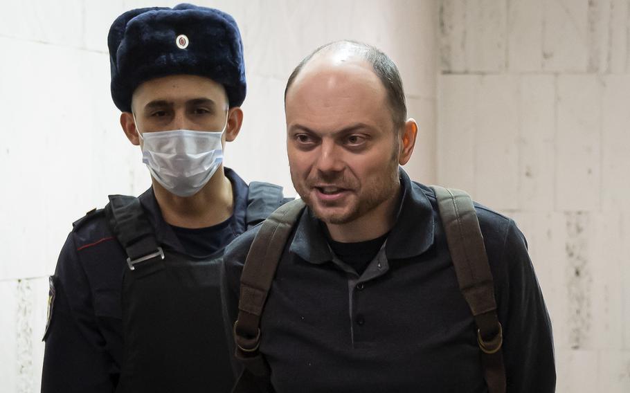 Russian opposition activist Vladimir Kara-Murza is escorted to a hearing in a court in Moscow, Russia, Feb. 8, 2023. The U.S. has imposed sanctions and visa restrictions on six Russian officials and an expert witness involved in the incarceration of Vladimir Kara-Murza, a Russian opposition leader who has been imprisoned in Moscow since April for speaking out against Russia's invasion of Ukraine.