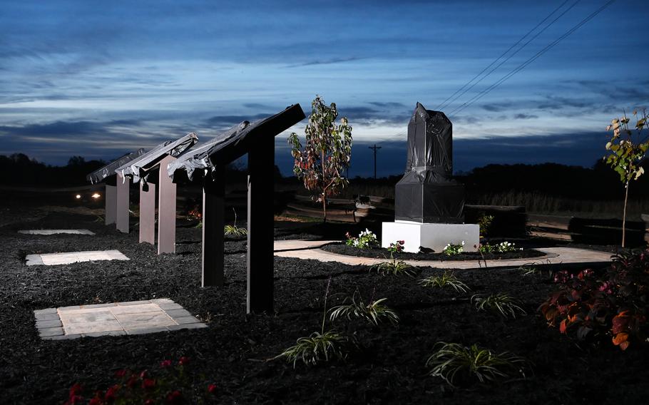 A monument to African American Union Civil War soldiers and three panel markers are seen covered on Nov. 4, 2021, in Culpeper County, Va. They will be unveiled during a ceremony on Saturday. MUST CREDIT: Washington Post photo by Matt McClain