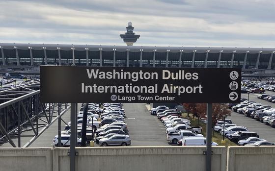 The metrorail station at Dulles International Airport is seen Nov. 2, 2022, in Chantilly, Va., with the terminal in the background. 