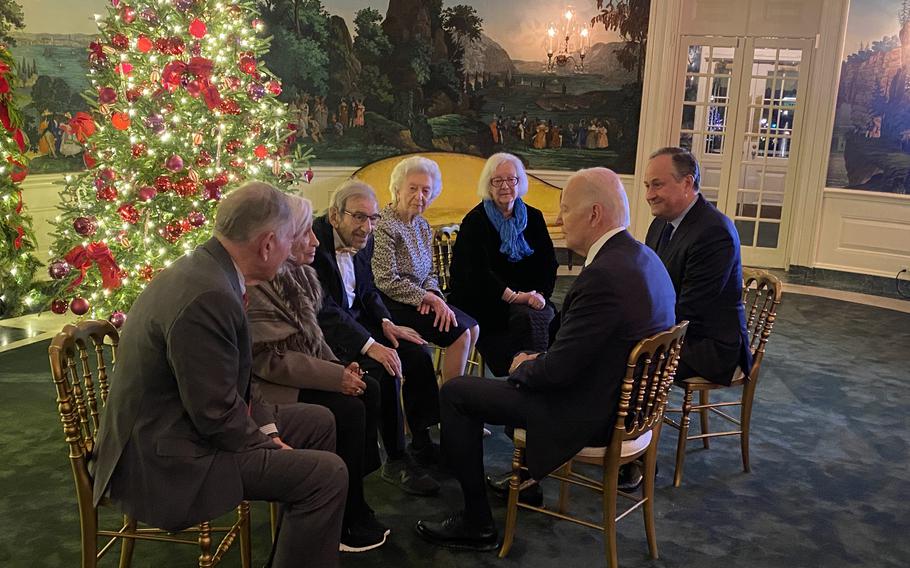 Saul Dreier, center, and other Holocaust survivors meet President Biden at the 2023 White House Hanukkah party. Dreier said playing at the White House was his favorite performance to date. “I loved that. You can’t imagine how much,” Dreier said.