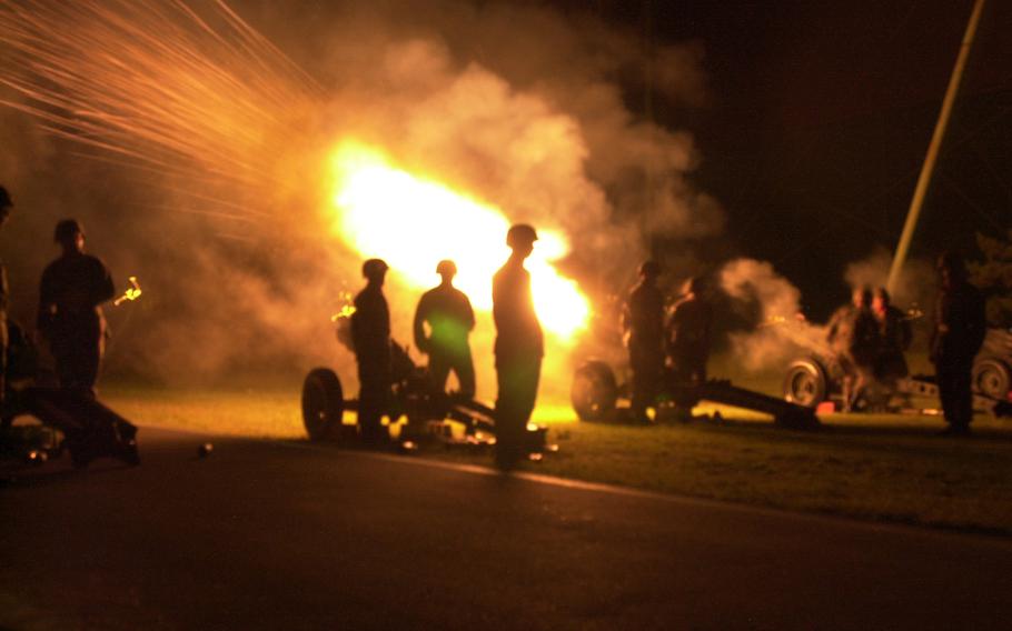 Soldiers fire cannons