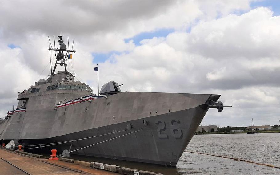 LCS-26 sits at a dock on the Mobile waterfront on May 20, 2021, prior to its commissioning as the USS Mobile.