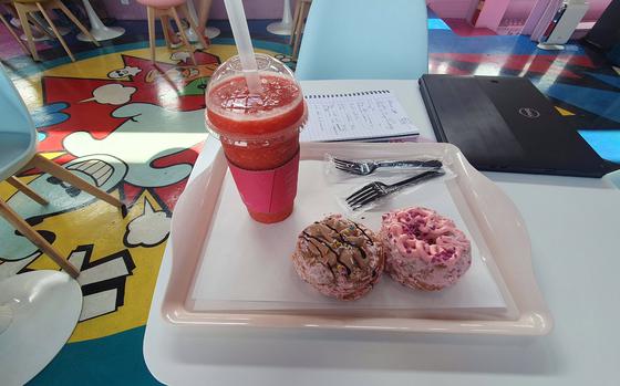 A strawberry smoothie and two strawberry frosted doughnuts from Monster Donut & Gelato in Pyeongtaek, South Korea.