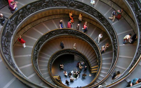 Vatican City, Rome, Italy, October 21, 2005: The spiral staircase at the Vatican Museum is a work of art in itself. Looking to escape the summer heat and dive into a museum? Check out Stars and Stripes' list of base tours here https://www.stripes.com/living/europe_travel/events/   META TAGS: Europe; summer; tourism; museum