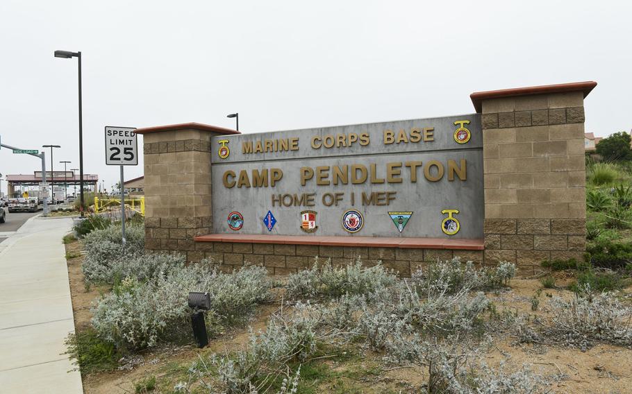 A Camp Pendleton sign sits outside the main gate of the Marine Corps base in Southern California.
