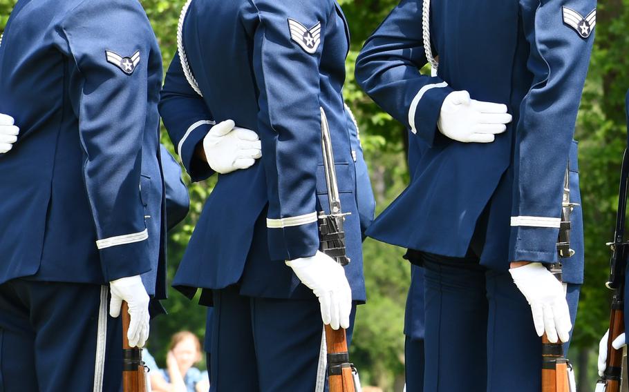 U.S. Air Force Honor Guard Drill Team performs at the 50th commemoration of the Vietnam War in Washington, D.C.