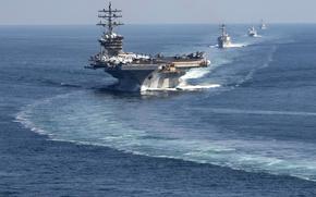 The Dwight D. Eisenhower Carrier Strike Group transits the Strait of Hormuz, Nov. 26, 2023. An Iranian drone came within 1,500 yards of the aircraft carrier as it conducted flight operations in the international waters of the Persian Gulf on Nov. 28. 