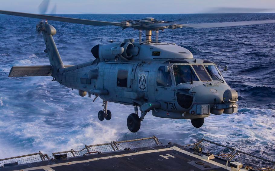 Sailors aboard the  destroyer USS Bulkeley participate in flight operations Jan. 5, 2024, in the Mediterranean Sea. U.S. Navy sailors helped save the lives of 30 people stranded on a boat adrift for days in the eastern Mediterranean July 16, 2024. Another passenger died following attempts at resuscitation. 