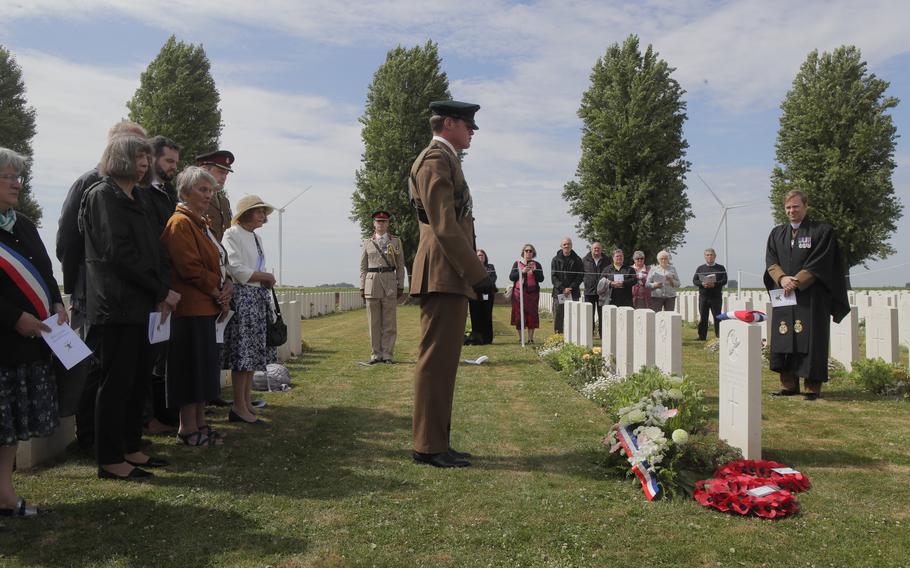 Captain Thomas Westlake, 5th Battalion The Rifles stands during the Rededication Service for Second Lieutnant Osmund Bartle Wordsworth, in the cemetery of Ecoust-Saint-Mein, northern France, Tuesday, June. 21, 2022.
