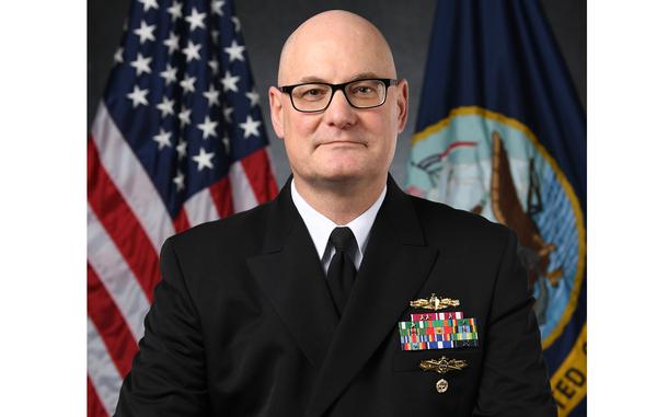 Smith in uniform in an official Navy portrait.