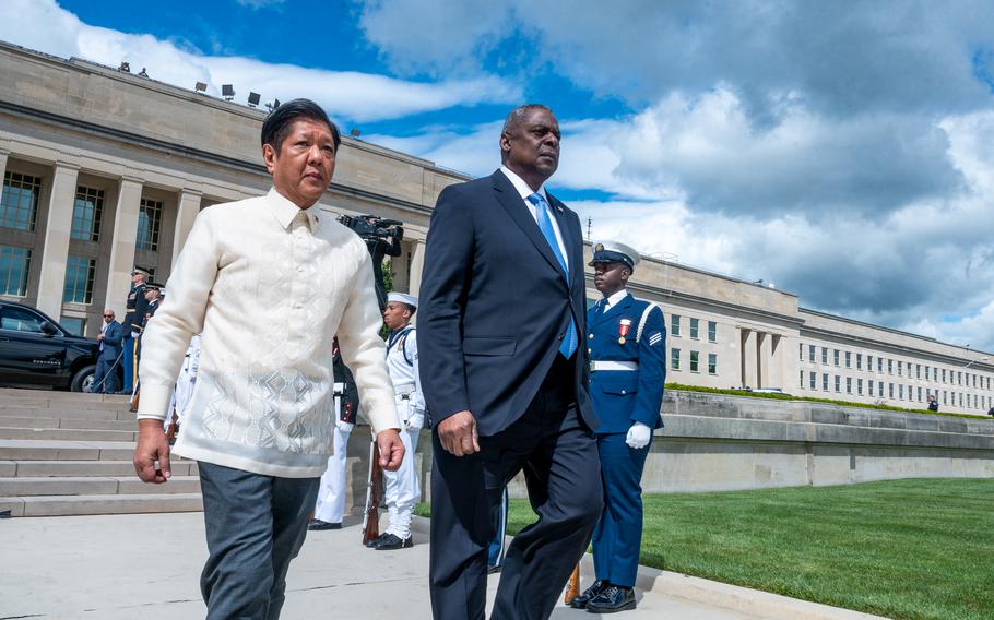 Defense Secretary Lloyd Austin and Philippines President Ferdinand Marcos participate in a meeting at the Pentagon on May 3, 2023. 