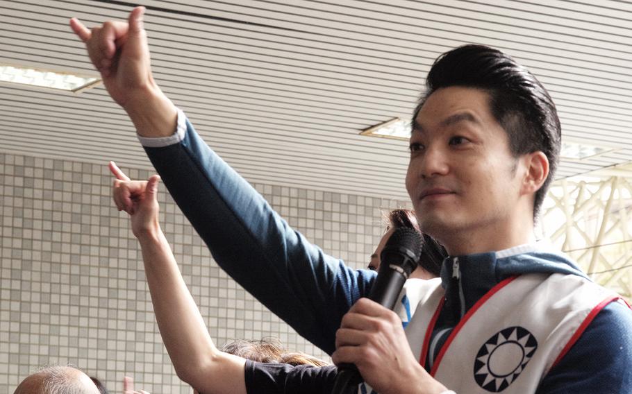 Chiang Wan-an, great-grandson of the late president Chiang Kai-shek from the main opposition Kuomintang (KMT), gestures during an elections campaign in New Taipei City on Nov. 5, 2022.