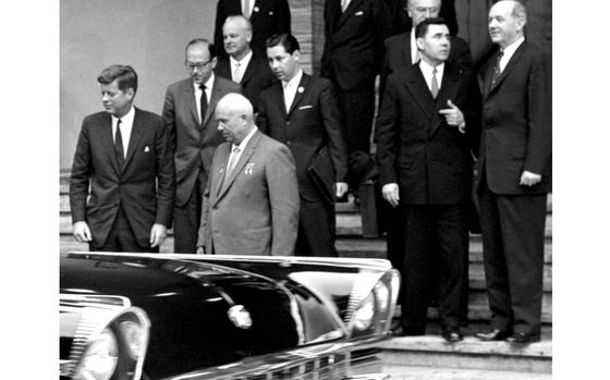 Gus Schuettler / ©Stars and Stripes
Vienna, Austria, June, 1961: President John F. Kennedy and Soviet leader Nikita Khrushchev watch as Khrushchev's limousine pulls up following one of their meetings at the U.S. Embassy. At right, Secretary of State Dean Rusk confers with his Soviet counterpart, Andrei Gromyko. This Sunday, May 29, would have been Kennedy's 99th birthday.