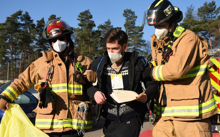 American first responders assist a victim during a mass casualty response drill at Landstuhl Regional Medical Center, Germany, Thursday, March 10, 2022.